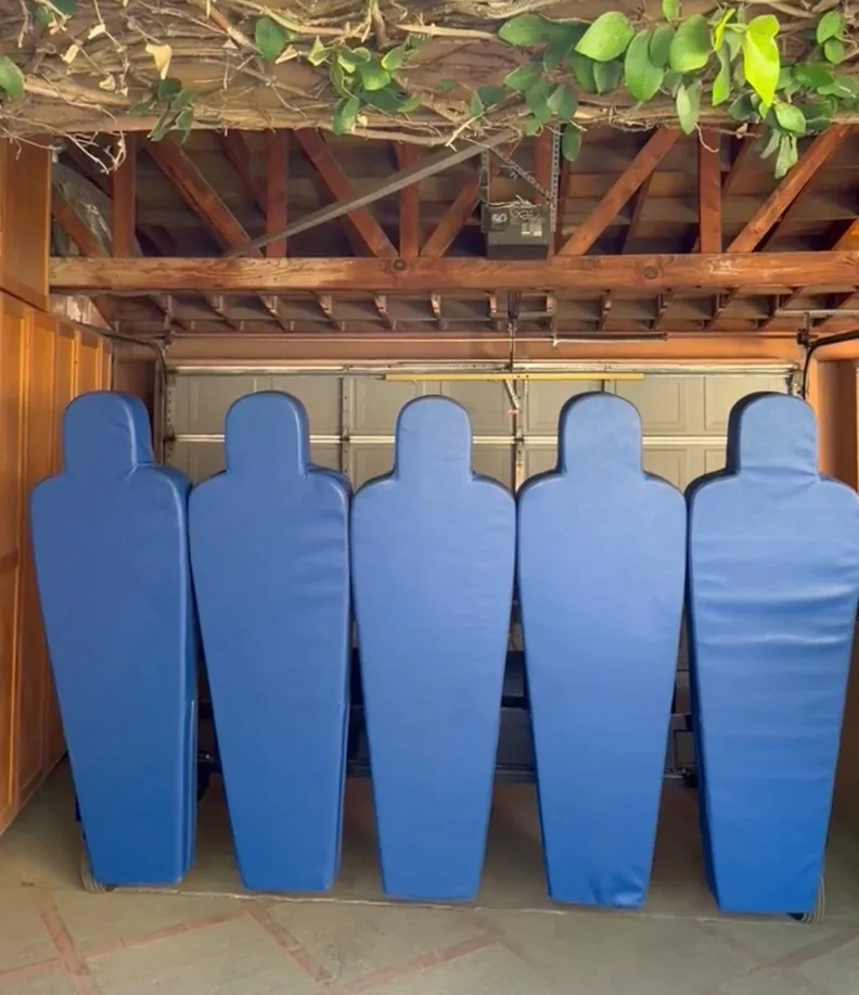 KV Robotic Wall with five blue padded defenders